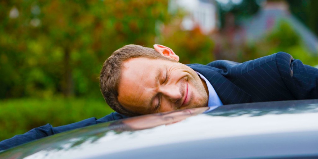 TrueCar-Steals-on-Wheels-120229-0308-man-hugging-car1